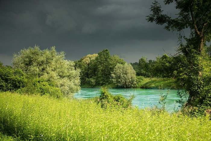 River in Bavaria, Germany with stormy clouds
