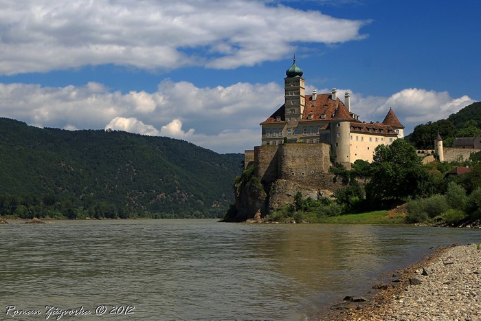 Schoenbuehel Castle on a cliff overlooking a river in Austria
