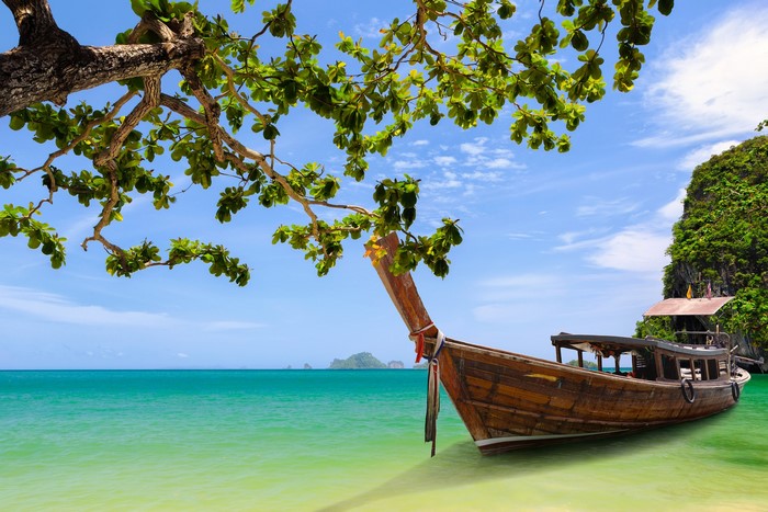Longtail boat on a tropical beach in Thailand