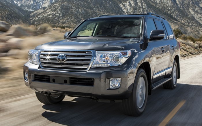 Toyota Land Cruiser 200 driving on a road
