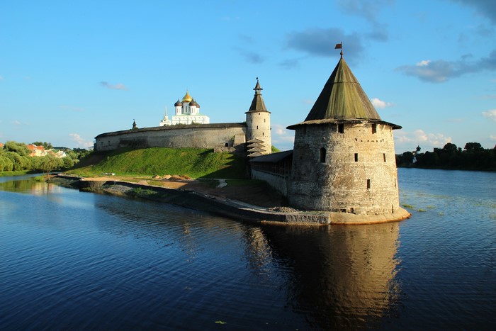 Pskov Kremlin fortress with towers and cathedral on a river