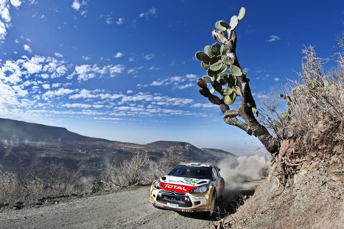 Citroen DS3 WRC car on a dusty road with cactuses