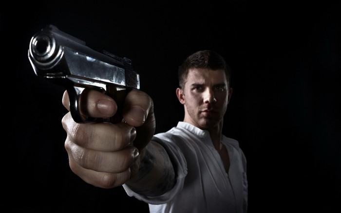Man holding a pistol
