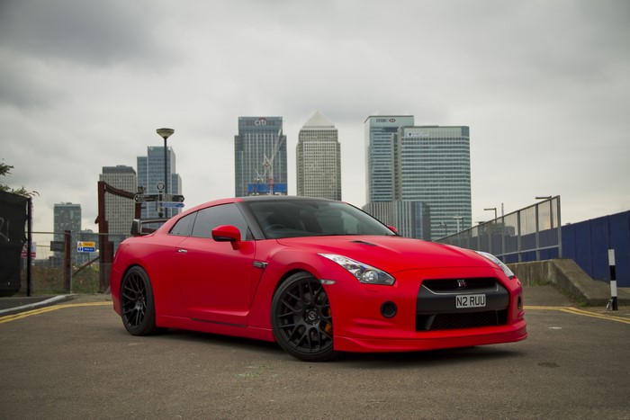 Red Nissan GT-R R35 with City Skyline