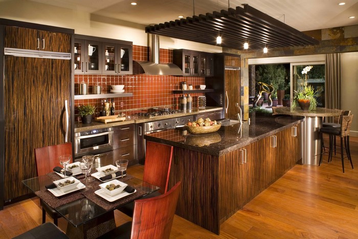 Modern kitchen with island and dining table