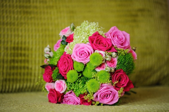 Pink and red roses bouquet with green flowers