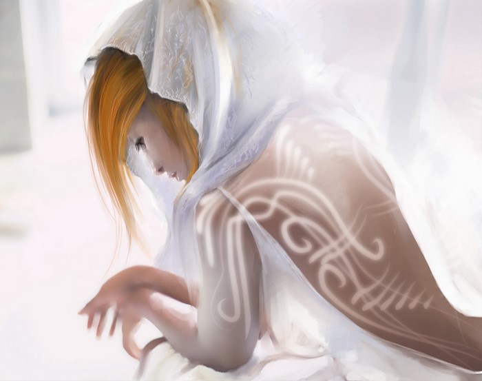 Woman with blonde hair wearing a white hood