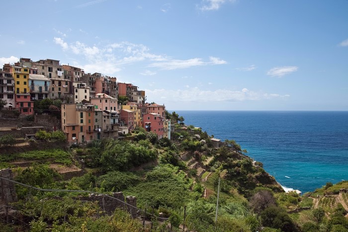 Colorful houses on a cliff overlooking the sea in Cinque Terre, Italy