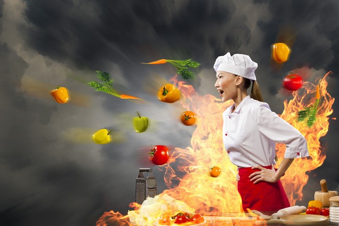 Asian Chef with Flying Vegetables and Fire