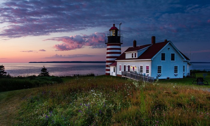 West Quoddy Head Lighthouse and keeper's house at sunset