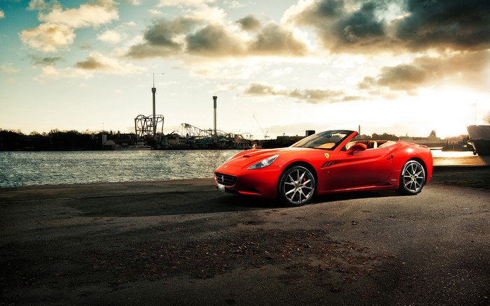 Red Ferrari California Convertible by the Water