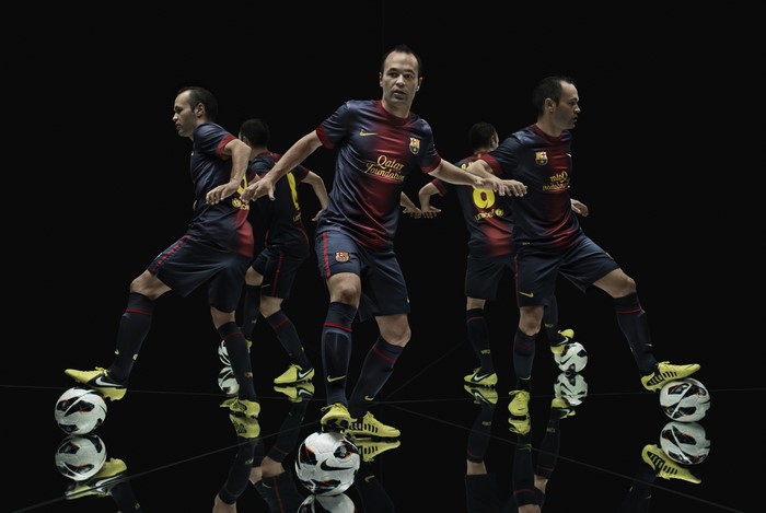 Andrés Iniesta with Footballs