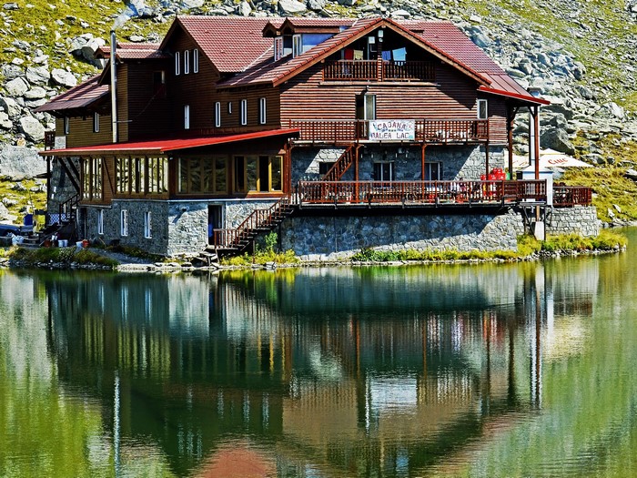 Wooden house on a lake in Romania