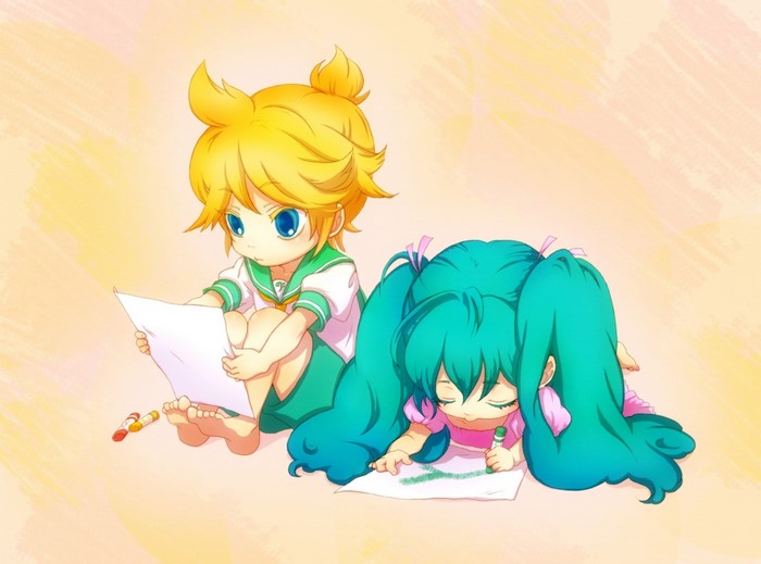 Two young girls drawing with crayons