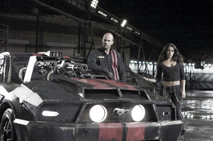 Death Race: Jason Statham and woman with machine gun car