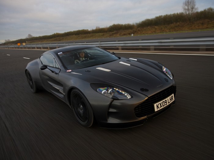 Aston Martin One-77 driving on a highway