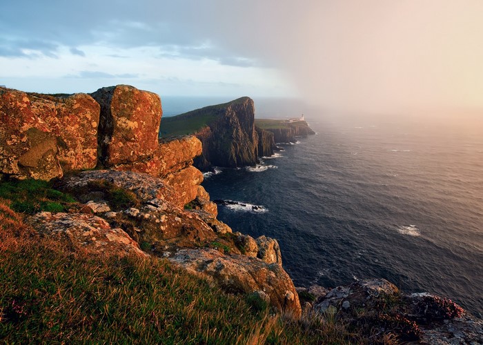 Rocky Coastline with Lighthouse in Scotland