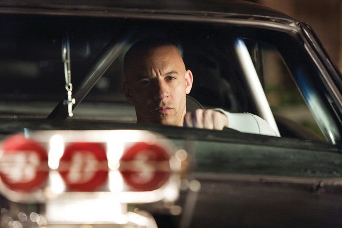 Vin Diesel driving a car in Fast & Furious