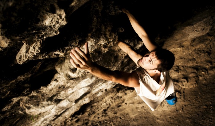 Man bouldering on a rock face