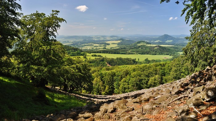 Panoramic view of rolling hills and forests in Czech Republic