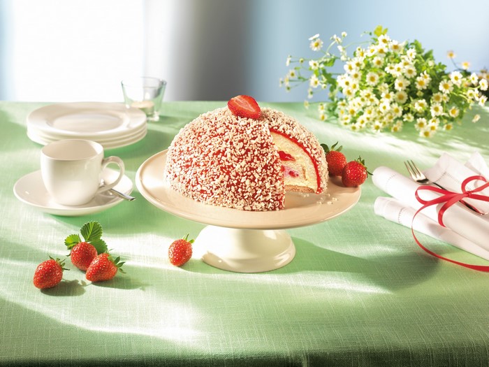 Strawberry cake with tea set and flowers