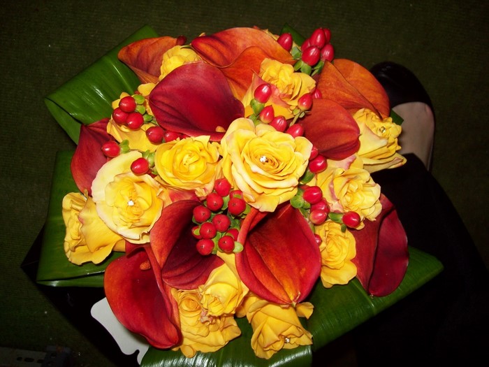 Yellow roses and red calla lilies bouquet