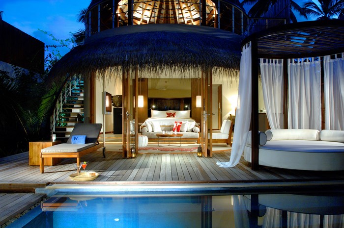 Maldives resort bungalow with pool and bedroom