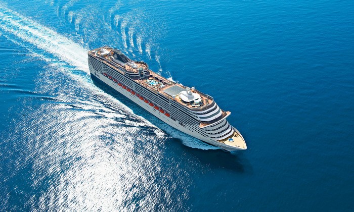 MSC cruise liner sailing on the blue sea from above