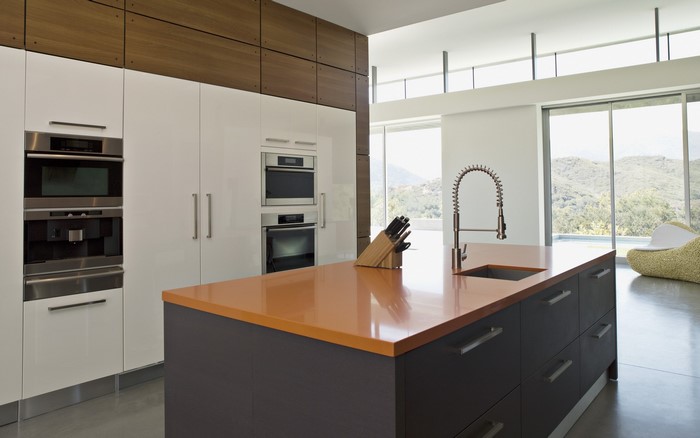 Modern kitchen with island and large windows