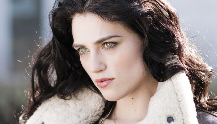 Katie McGrath looking to the side