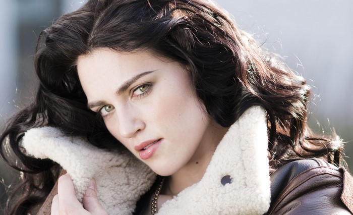 Katie McGrath with dark hair and green eyes