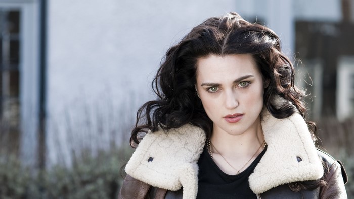 Katie McGrath looking to the side