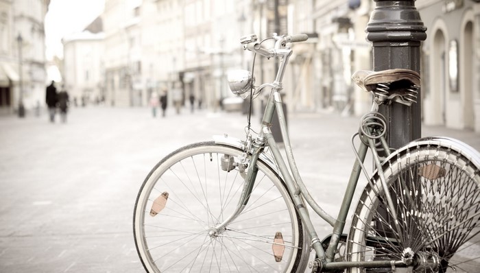 Vintage bicycle parked on a city street