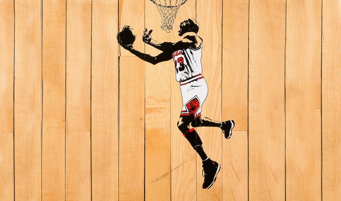 Michael Jordan playing basketball on wood planks
