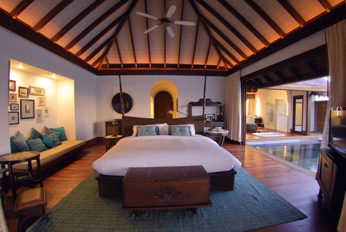 Luxury bedroom with a private pool and open-air bathroom