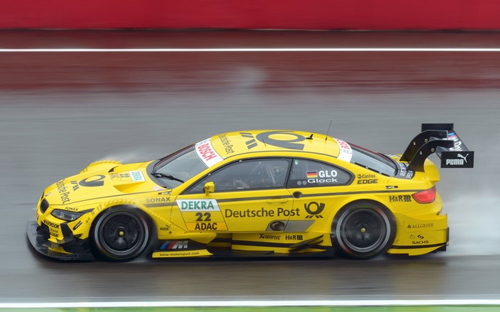 Yellow BMW M3 DTM Race Car with "Deutsche Post" Livery