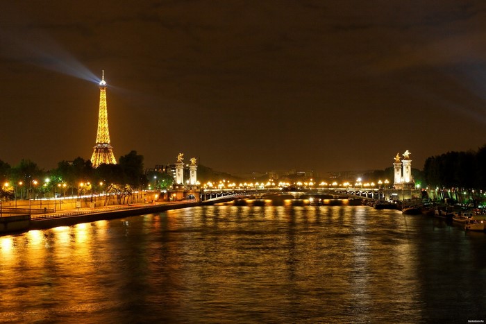 Eiffel Tower and Seine River at Night in Paris