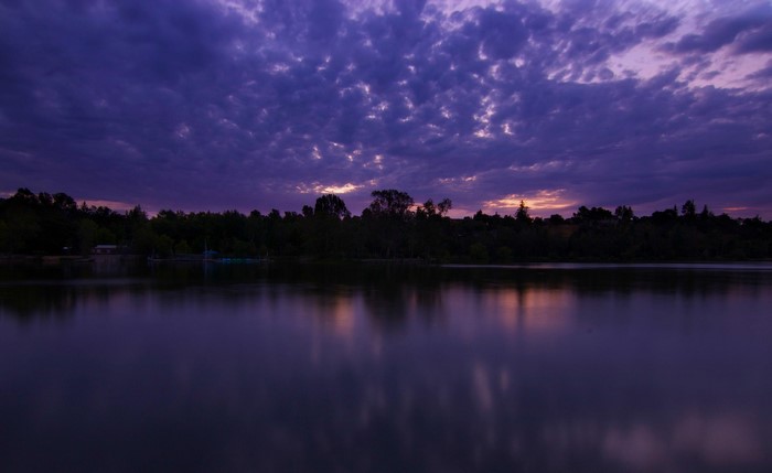 Purple Clouds Over Lake at Dusk in California