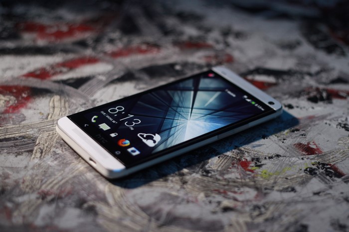 HTC Smartphone on a textured surface