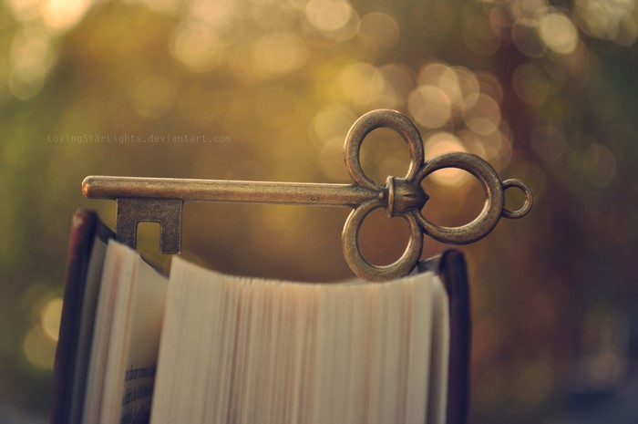 Antique Key on Open Book