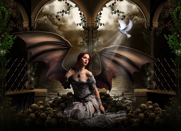 Gothic angel with wings sits on skulls under moon