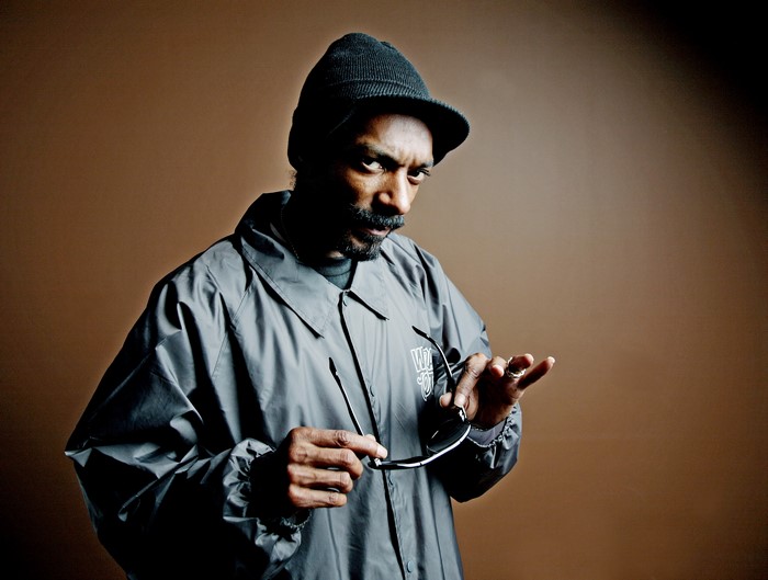 Snoop Dogg wearing a winter hat and jacket