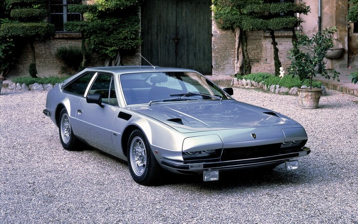 Silver Lamborghini Jalpa parked on gravel