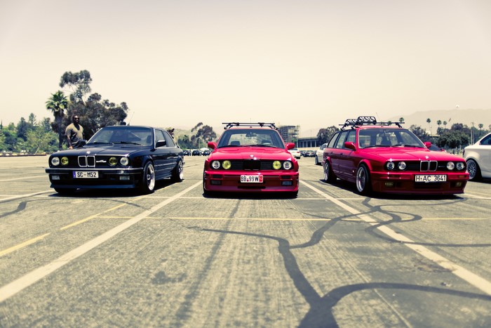 BMW E30 325i and E34 M5 in parking lot