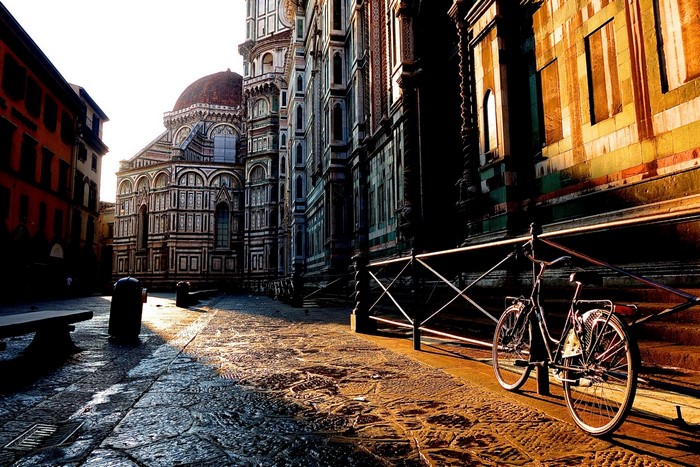 Florence Cathedral and bicycle on cobblestone street
