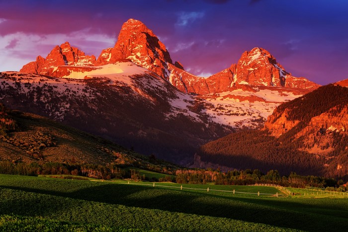 Grand Teton Mountains at Sunrise with Green Fields