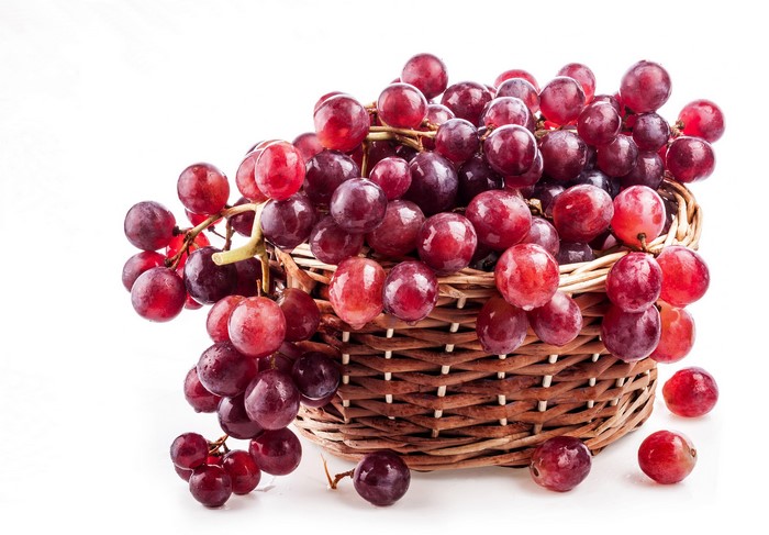 Red grapes in a wicker basket