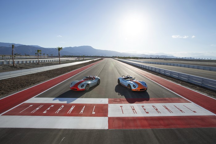 Two 2012 Lucra LC470 cars on a racetrack