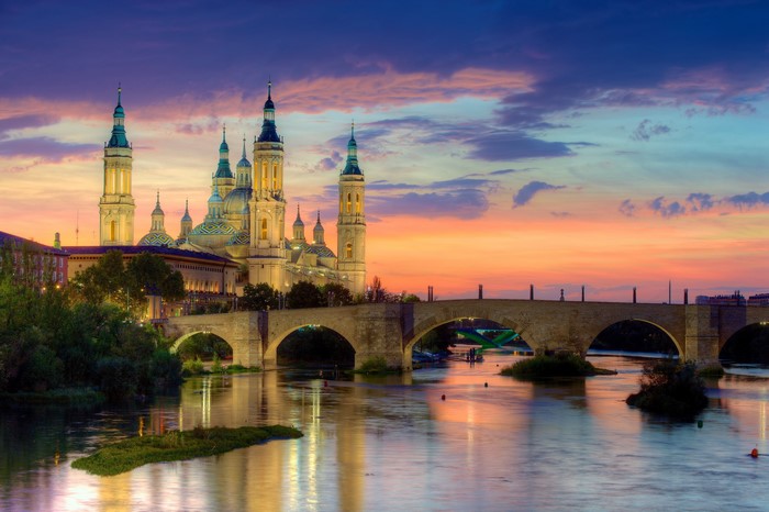 Basilica of Our Lady of the Pillar and Stone Bridge at Sunset