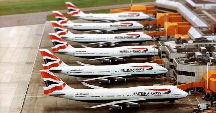 British Airways Boeing 747 airplanes lined up at airport